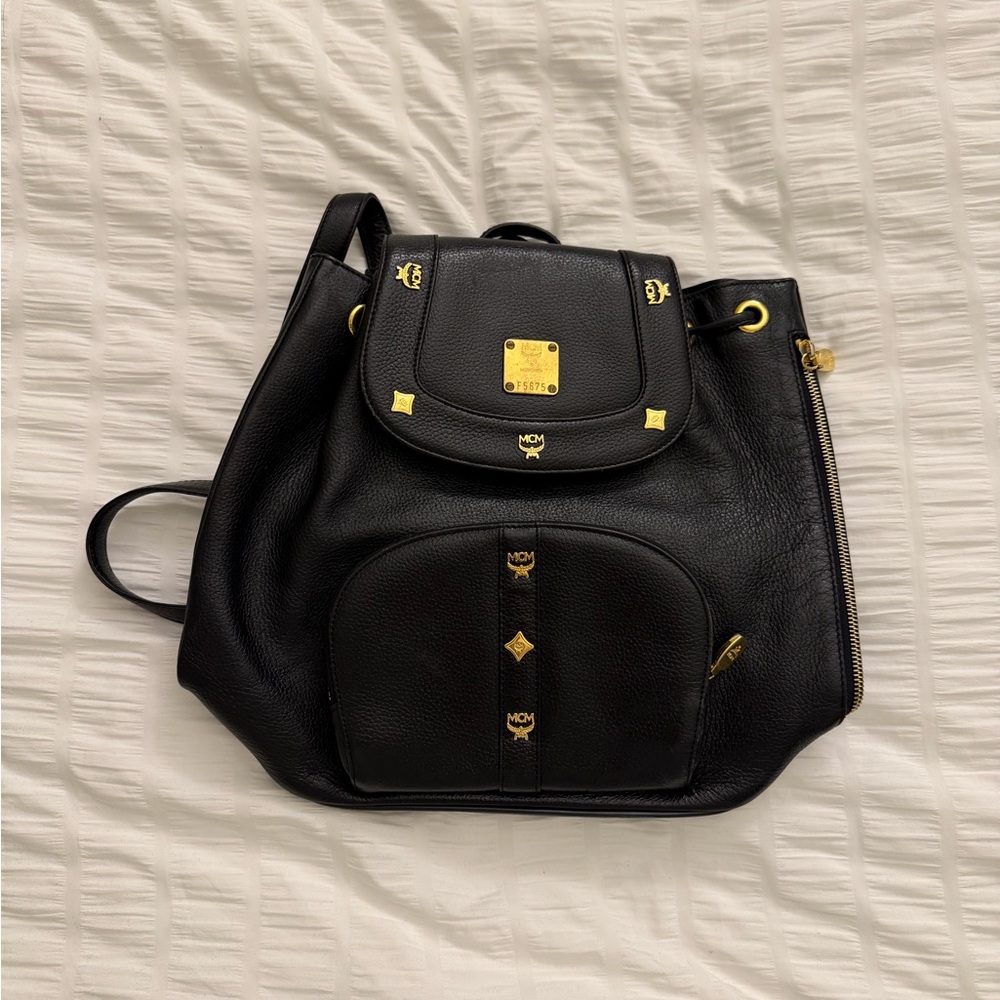 MCM Black and Gold Leather Backpack